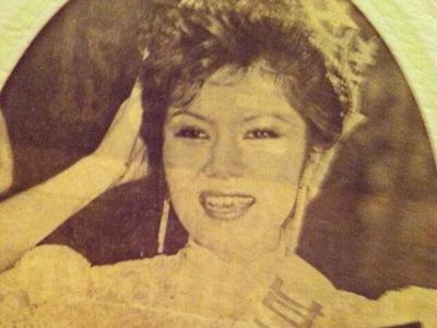 Judie Sok can be seen holding a crown on her head in this old picture.